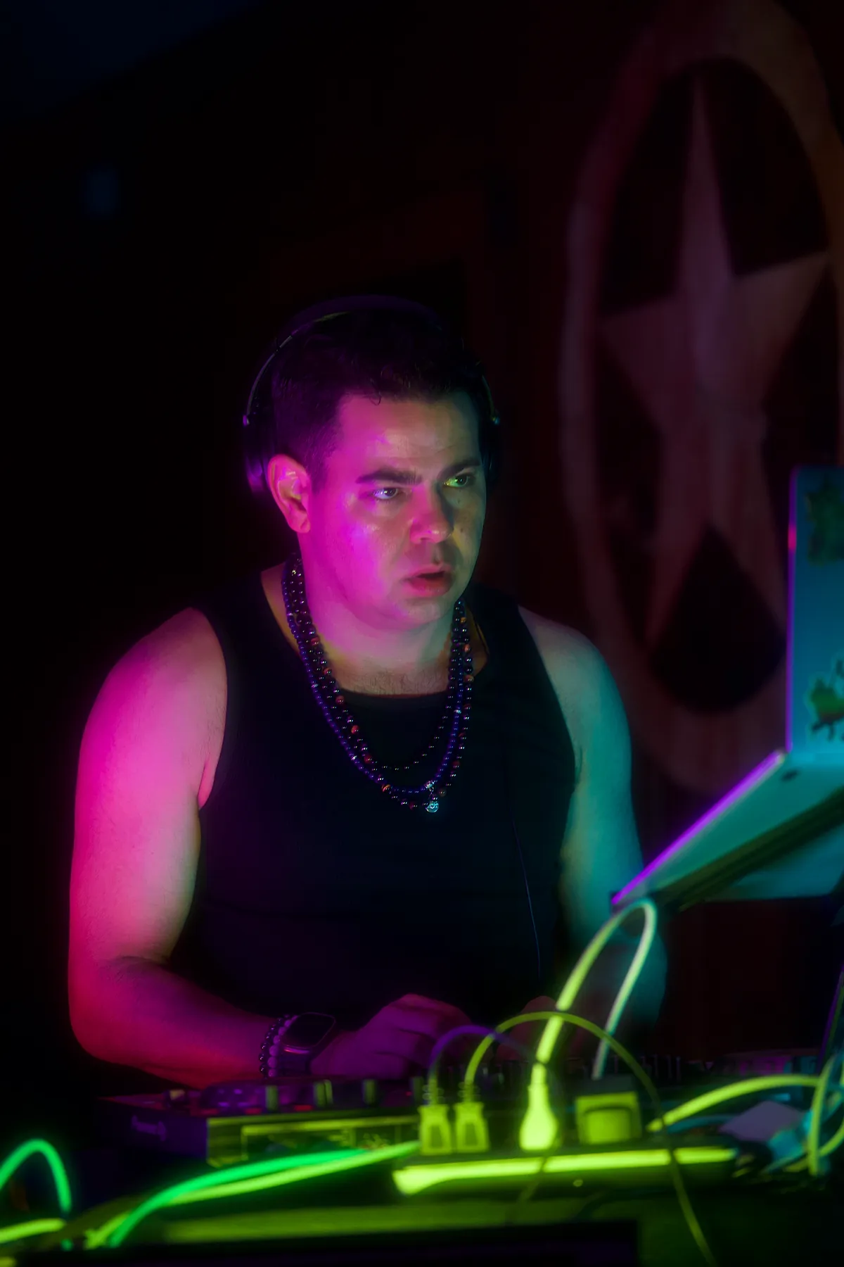 Billy Sage 5 under magenta stage light